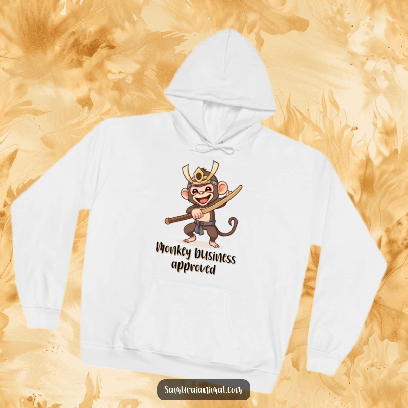 Funny hoodie showcasing a gleeful monkey in a samurai mask, wielding a wooden sword, radiating playful energy and readiness for adventure.