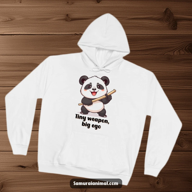 Funny plump panda comically wielding a toothpick sword from a cozy hoodie, radiating determined humor.