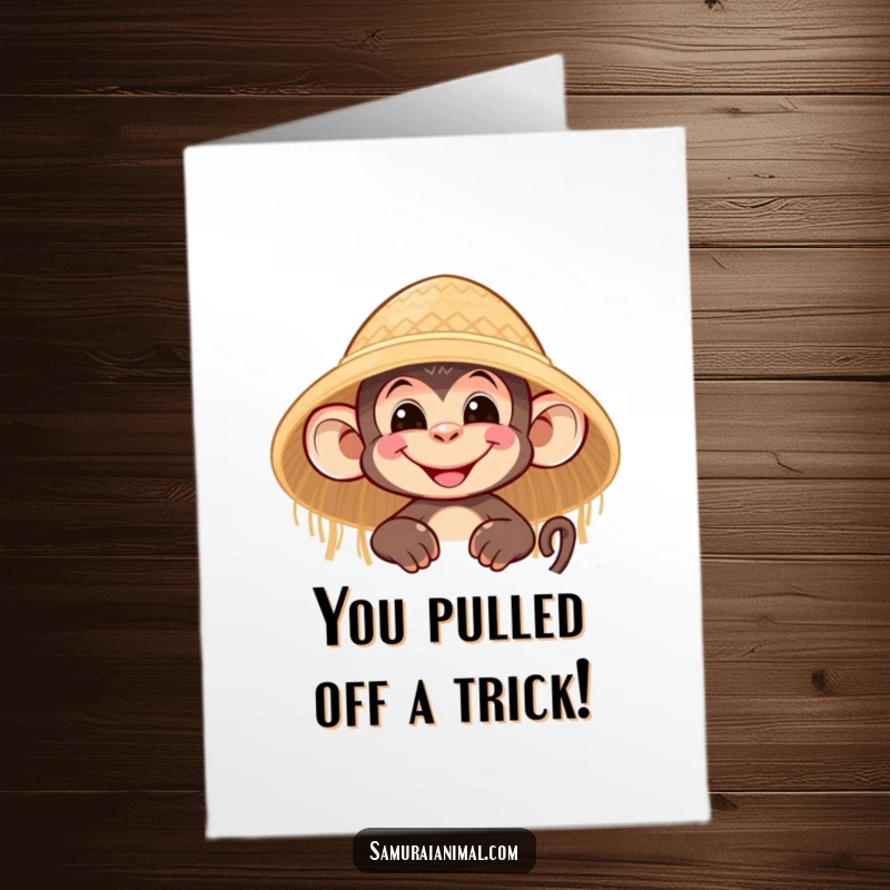 Funny Free Printable Congrats Card: A happy monkey peeks from a straw hat, celebrating your success with a grin.