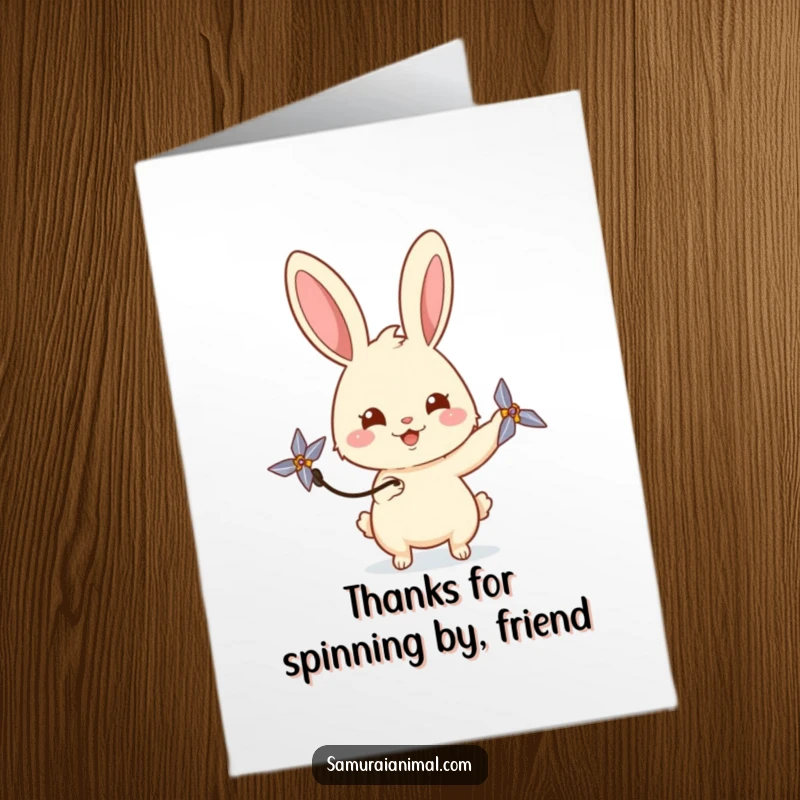 Funny Free Printable Thank You Card: Happy rabbit playfully spins a mini shuriken, conveying thanks with a curious gaze.