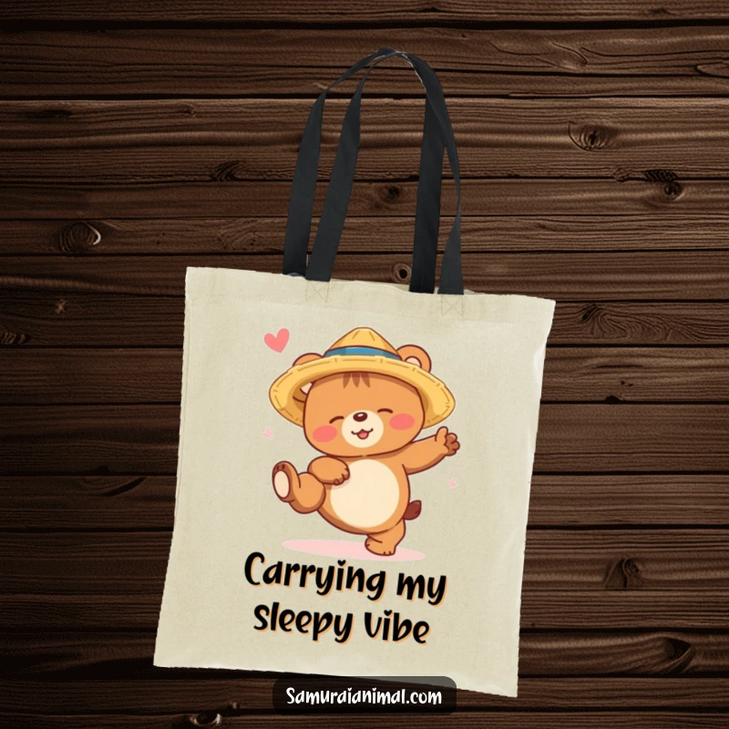 Funny bear cub tote bag showing a sleepy bear in a straw hat, smiling while attempting a high kick, ready for errands.