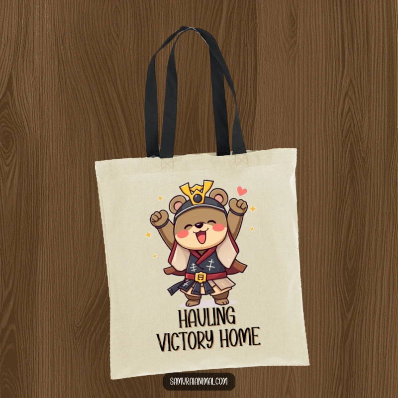 Funny tote bag designed with a courageous bear dressed as a samurai, cheering with joy, ideal for carrying everyday items.